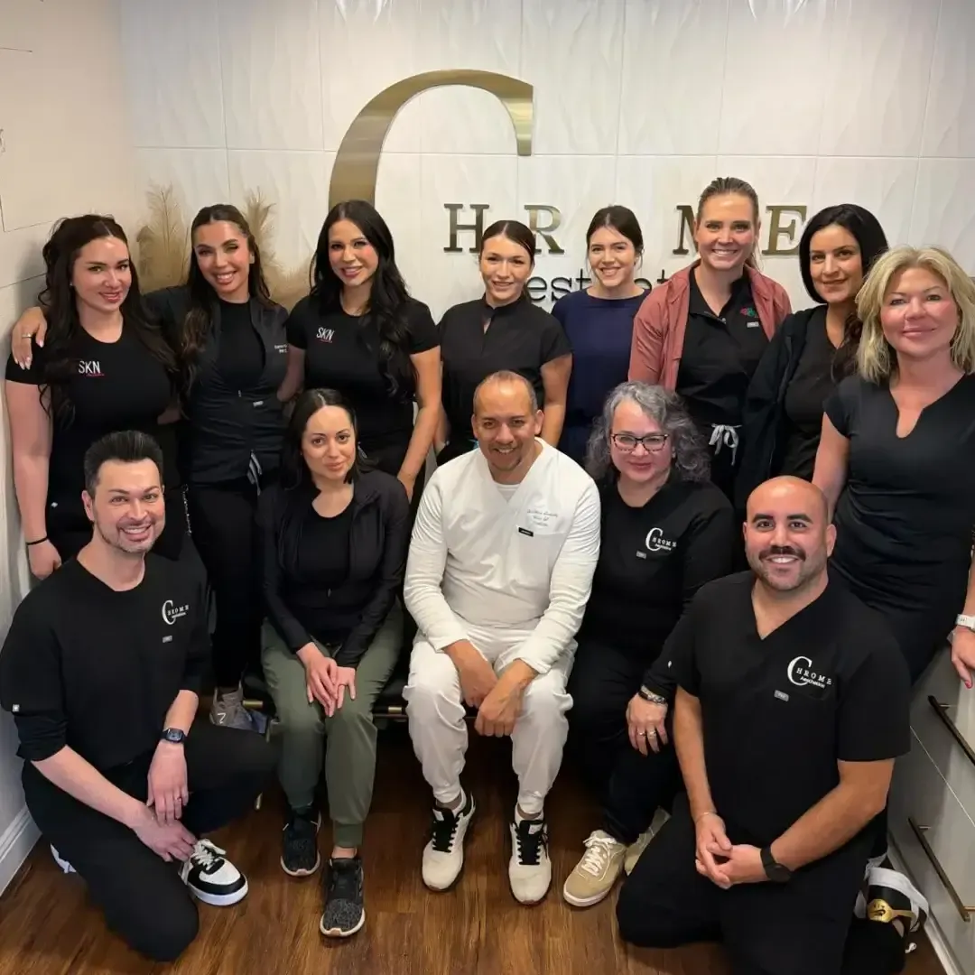 Medical injector trainees gathered together, celebrating the completion of their cadaver dissection training.