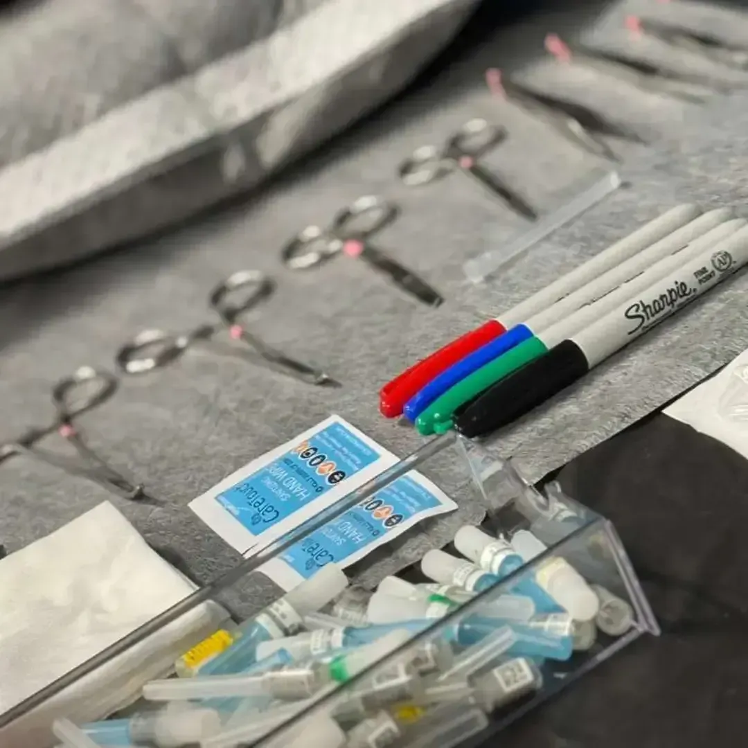 Sterile aseptic supplies and injection equipment including alcohol wipes, markers, and syringes prepared for a medical aesthetic procedure at Chrome Aesthetics.