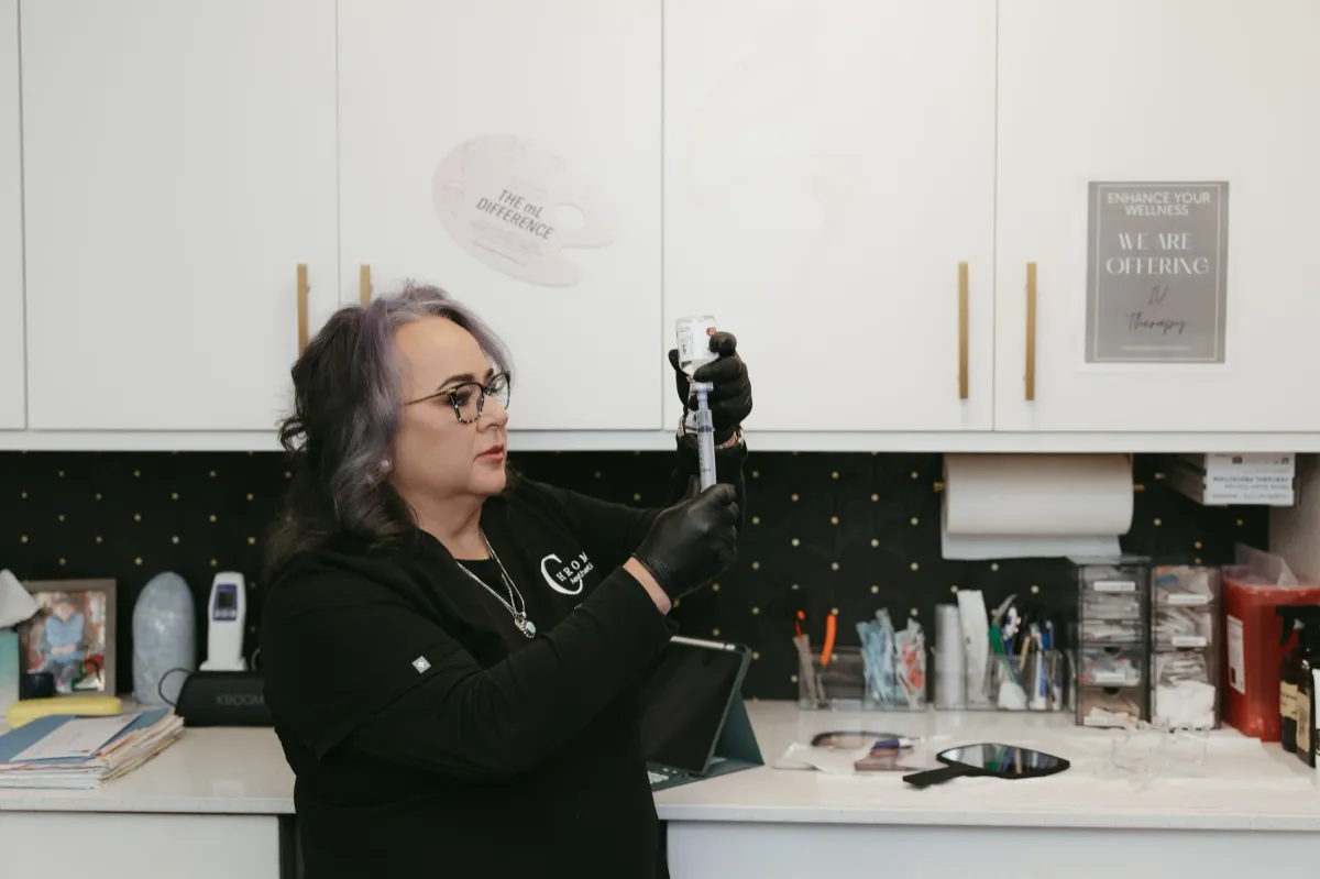 Barbara Franklin, NP-C, preparing an injectable syringe at Chrome Aesthetics Spa in Albuquerque, NM
