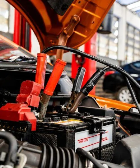 auto electrial repair - wires attached to a car battery