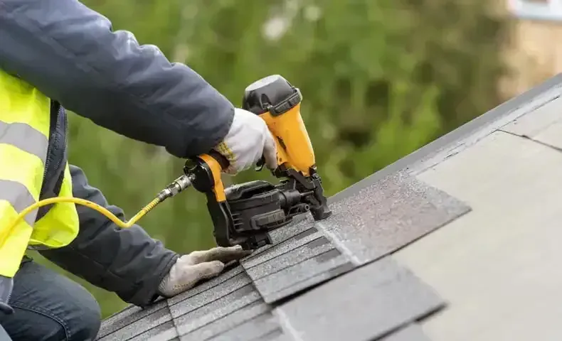 roofing nail gun nailing shingles