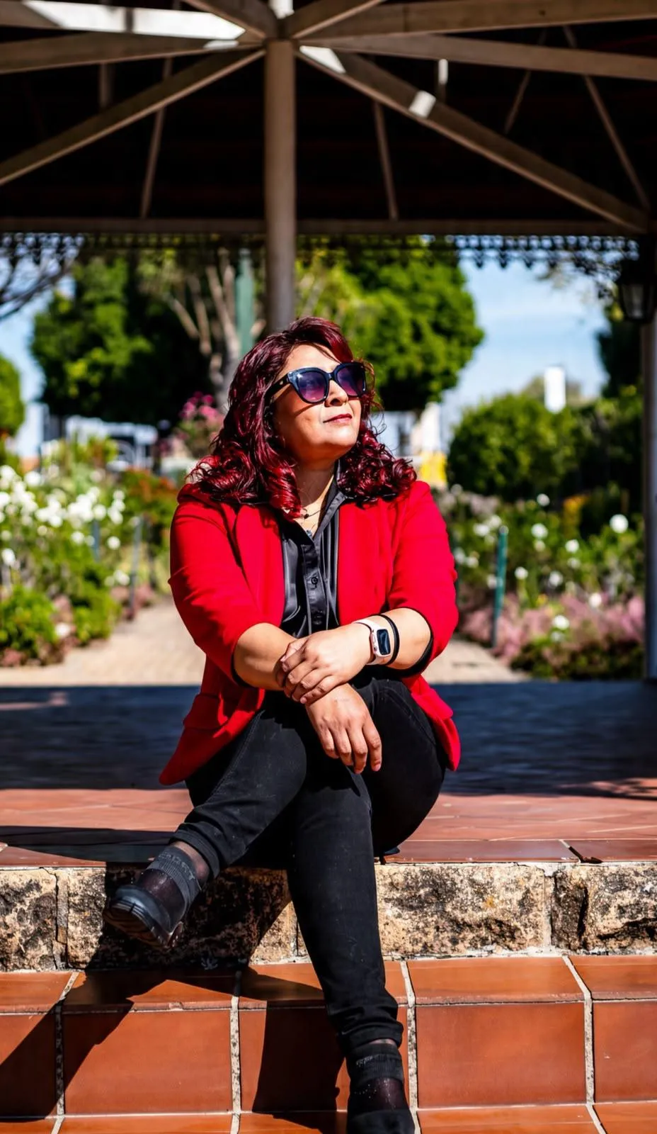 EmpowerHerHub Founder portrait in a warm film look