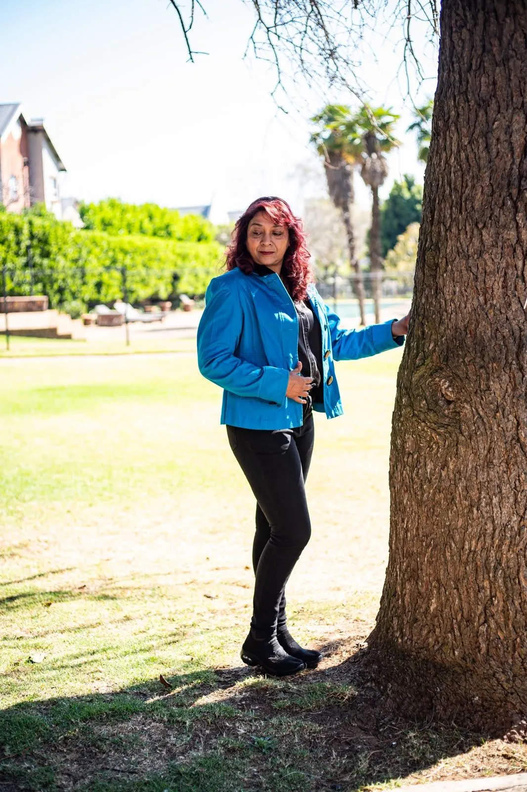 EmpowerHerHub Founder portrait in a warm film look