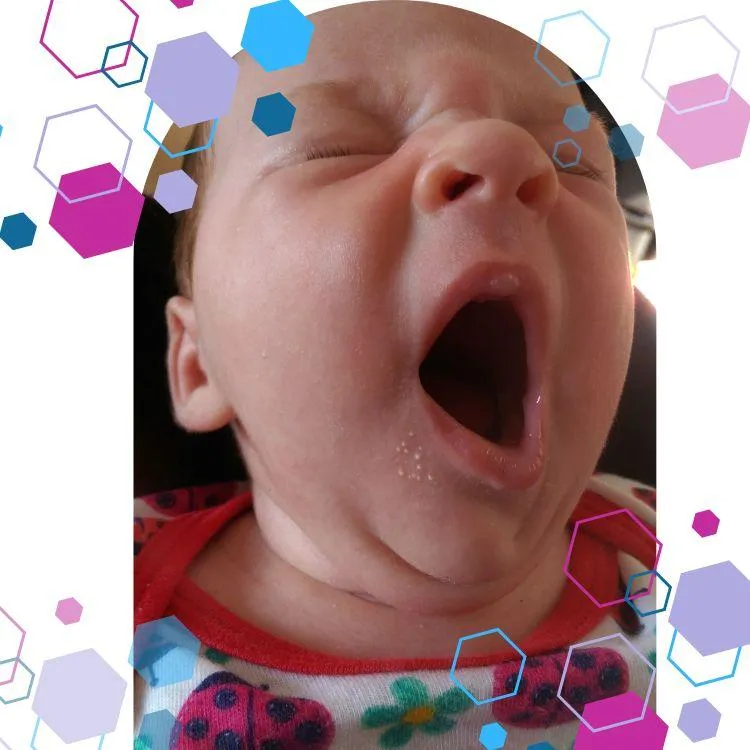 A close up image of a newborn baby yawning. CubCare hexagons are shown around the outside of the image for brand purposes. Image is being used to show the Infant Sleep Course.