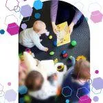 Image of three babies sitting on the floor surrounded with toys and Jilly, owner of CubCare baby classes showing them a book