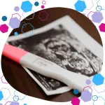 Positive pregnancy test resting on early ultrasound scan image — representing early pregnancy, first trimester symptoms, and discovering you’re pregnant.