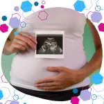 Pregnant person holding a first trimester ultrasound scan over their belly — representing early pregnancy, baby’s first scan, and antenatal care.