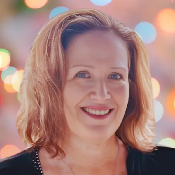 Headshot of Lisa Zaro, owner of Book More Celebrations. The background is light bokeh. The image is square with a simple outline around it Lisa Zaro is a professional wedding business coach and mentor. She is certified with the World Coach Institute and has been a wedding professional since 2009. She specializes in professional officiant and photo booth services at Zaro Celebrations in NY, USA.