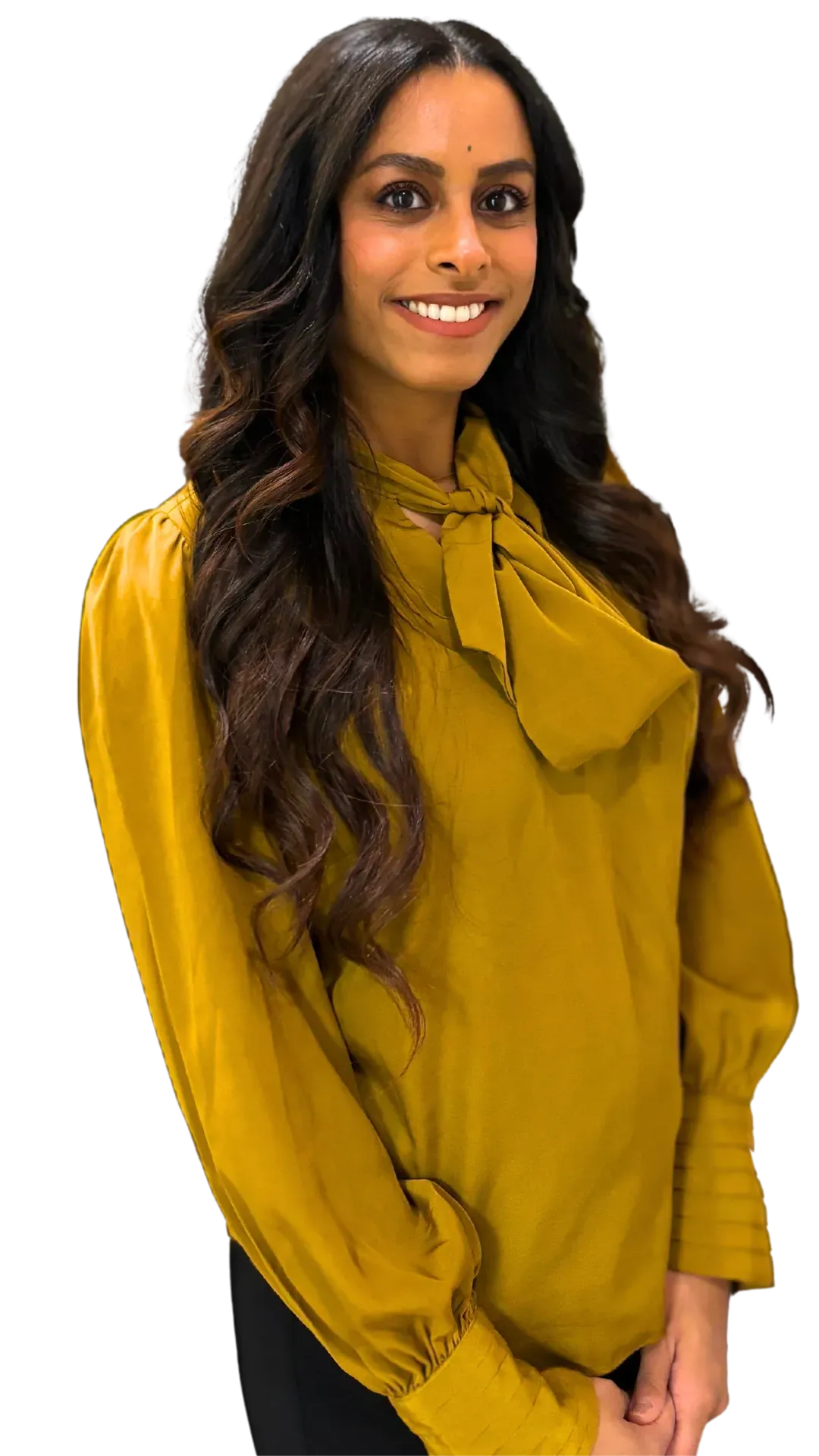 Darshana Patel, registered therapist and founder of Clear Moon Therapy in Ontario, Canada, smiling in a mustard blouse. Providing compassionate psychotherapy for anxiety, trauma, and self-growth.