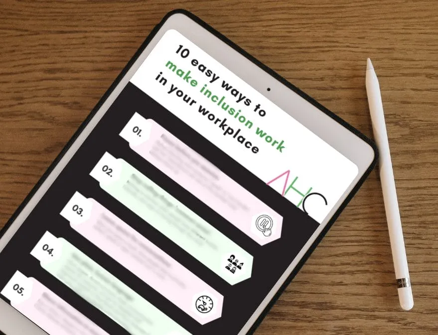 Tablet on a wooden table showing the 10 easy ways to make inclusion work in your workplace guide, with a stylus beside it.