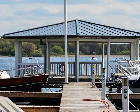 Boat dock with a metal roof