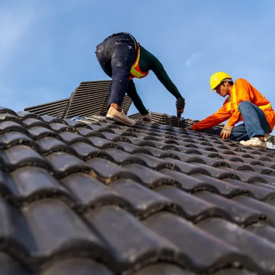 Team Armored Roofing crew member providing professional roofing services in Florida