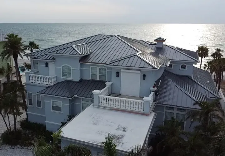 Gulf Blvd FL Coastal home with gaf standing seam metal roof installed by Team Armored