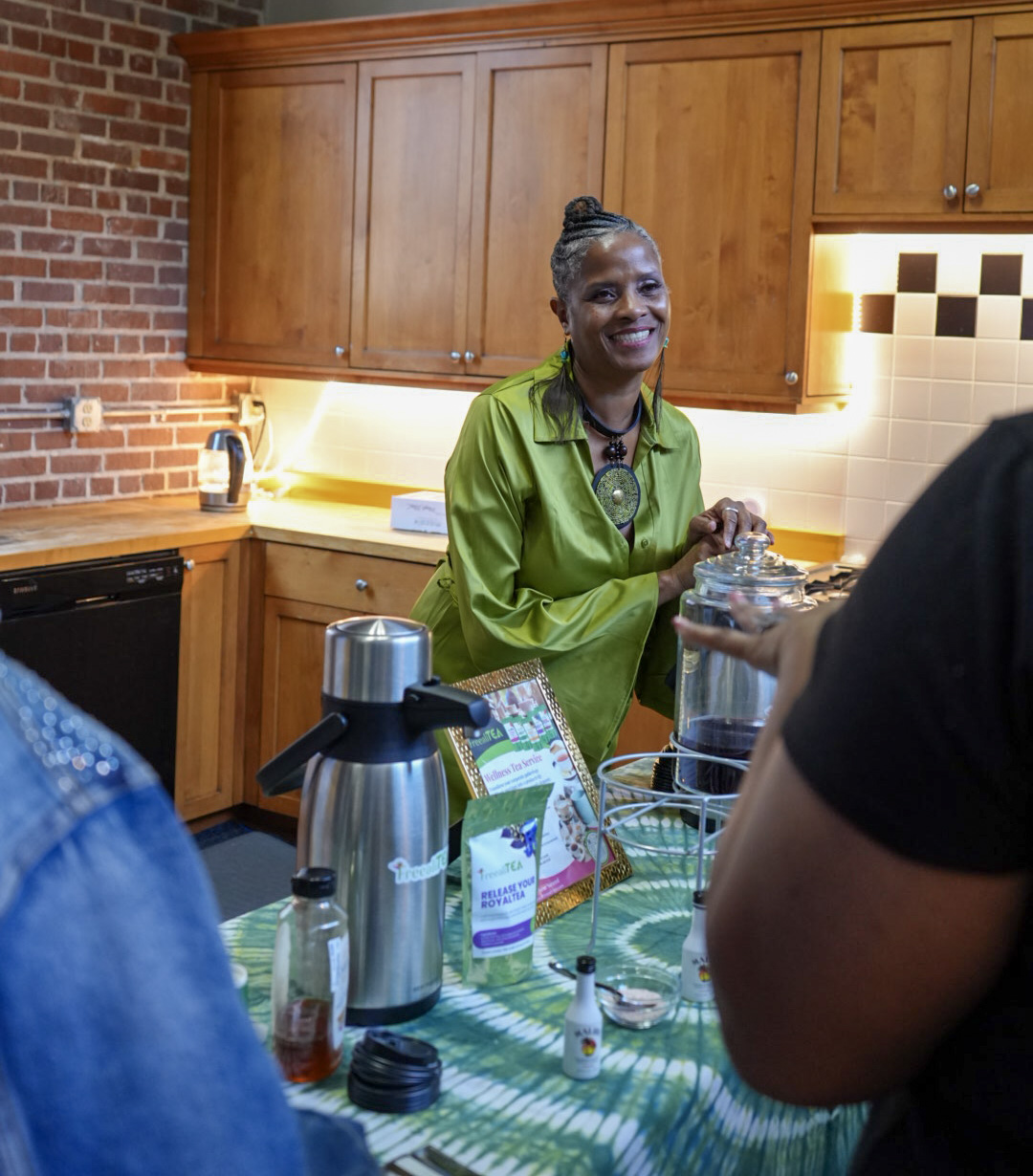 Hand-blended white tea with edible flowers in glass jar