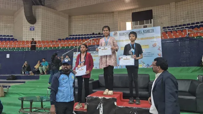 Students at CHESS KLUB with certificate on a Stage