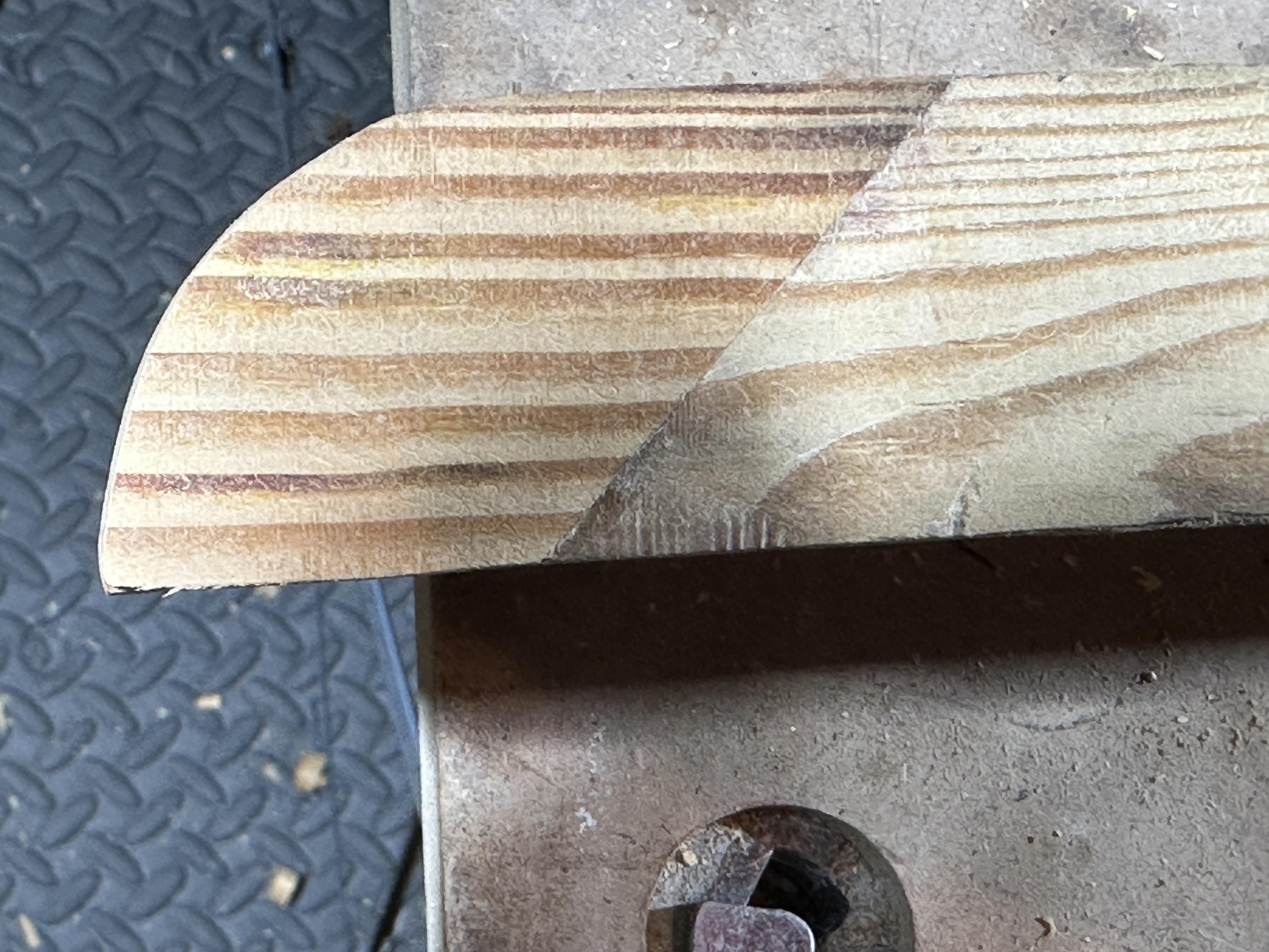 Close up of traditional artisan hand-crafting tools resting on historical woodwork