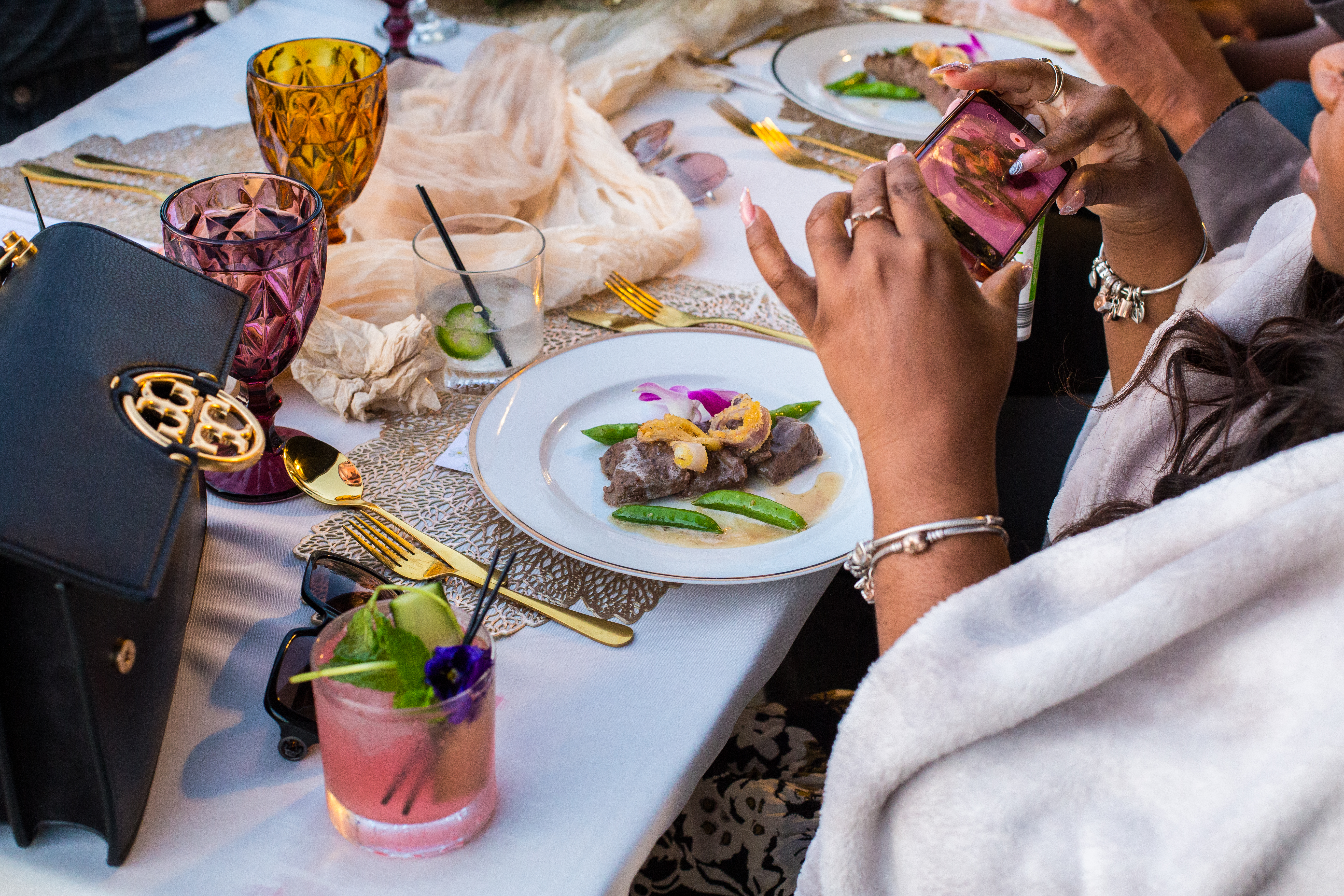 A table is set for a meal by the window.