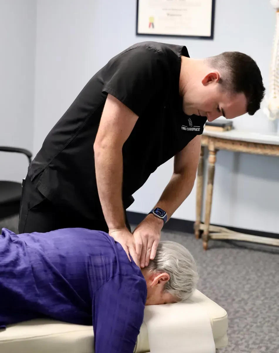 Neck adjustment by chiropractor in Tulsa for pain and mobility
