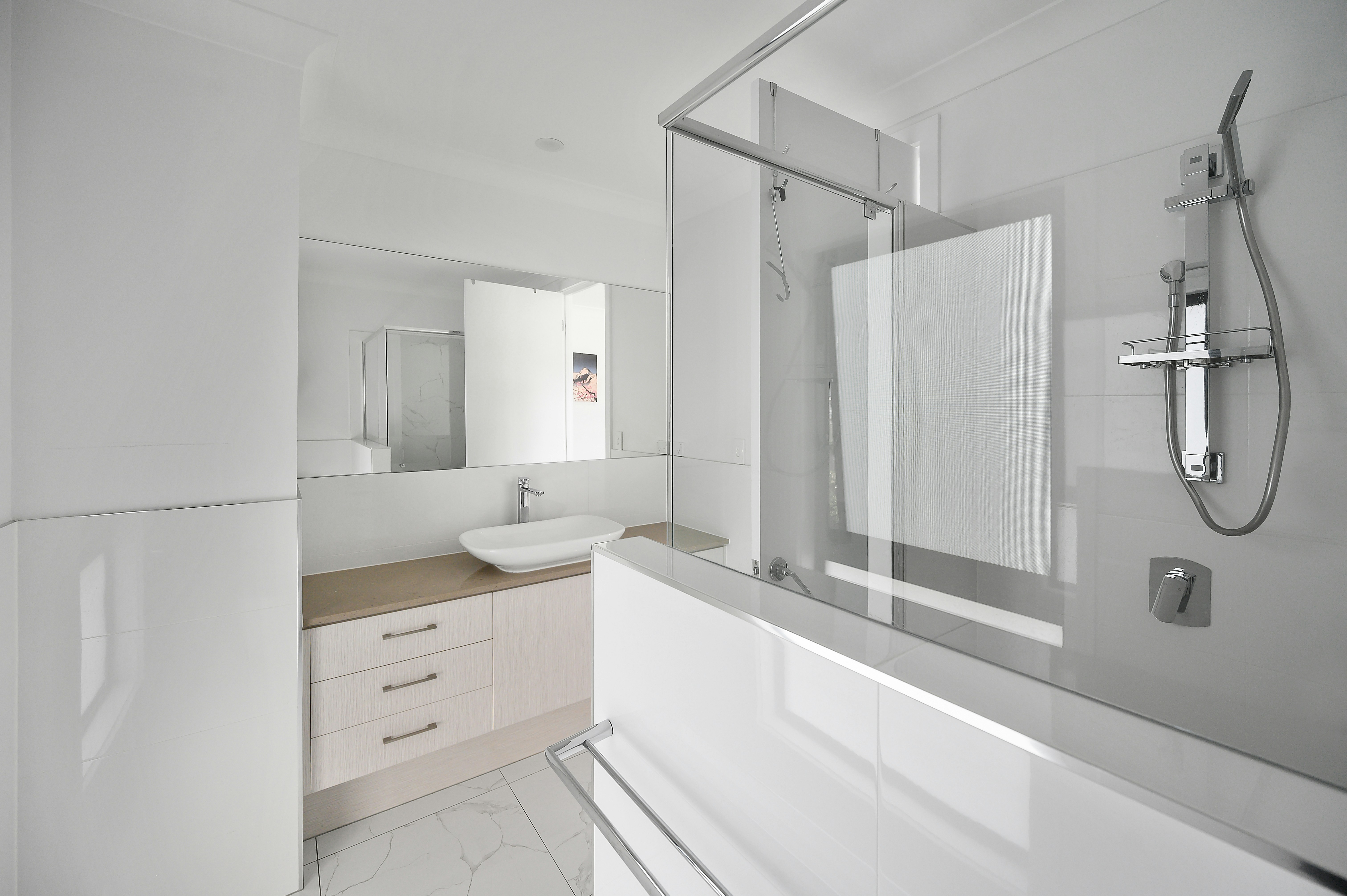 white silver bathroom with shower