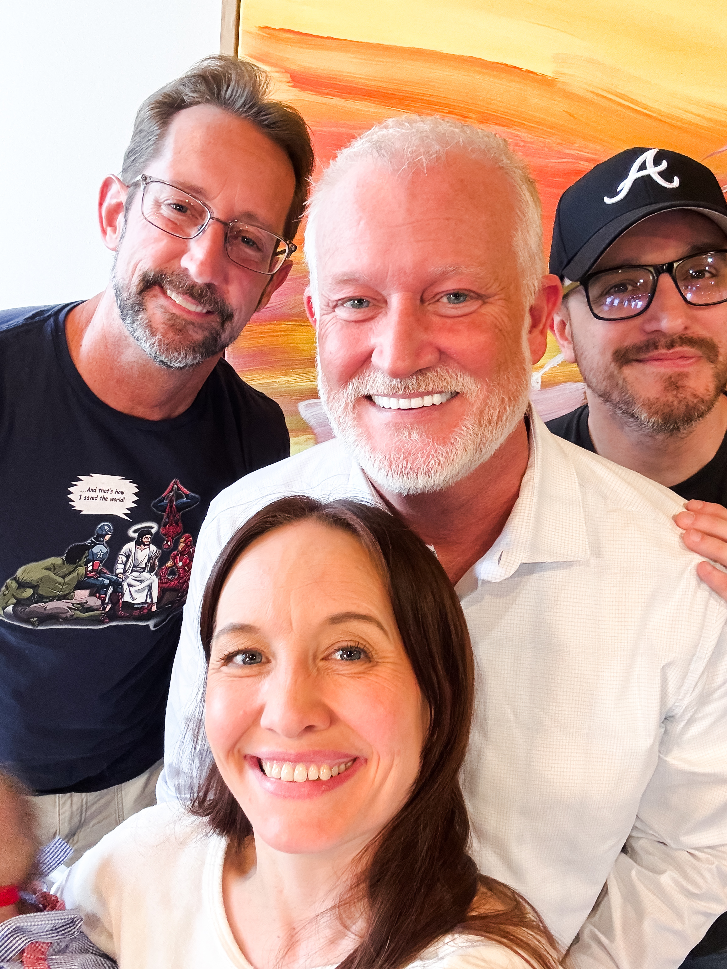 A diverse crowd of people looking upwards