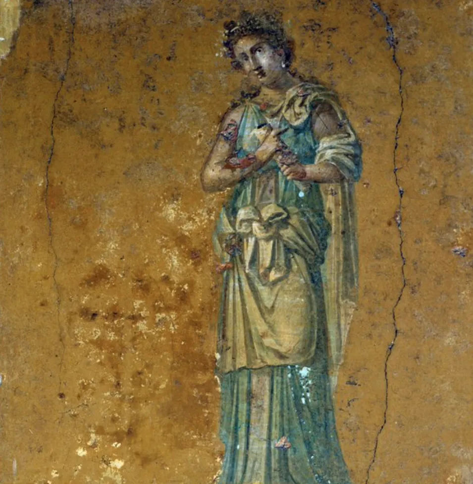 Representación de una musa en una pintura de Pompeya