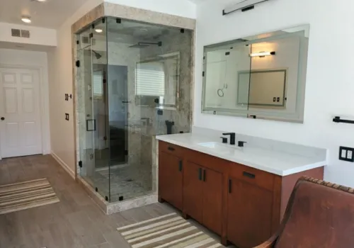 a kitchen with a stove top oven next to a window