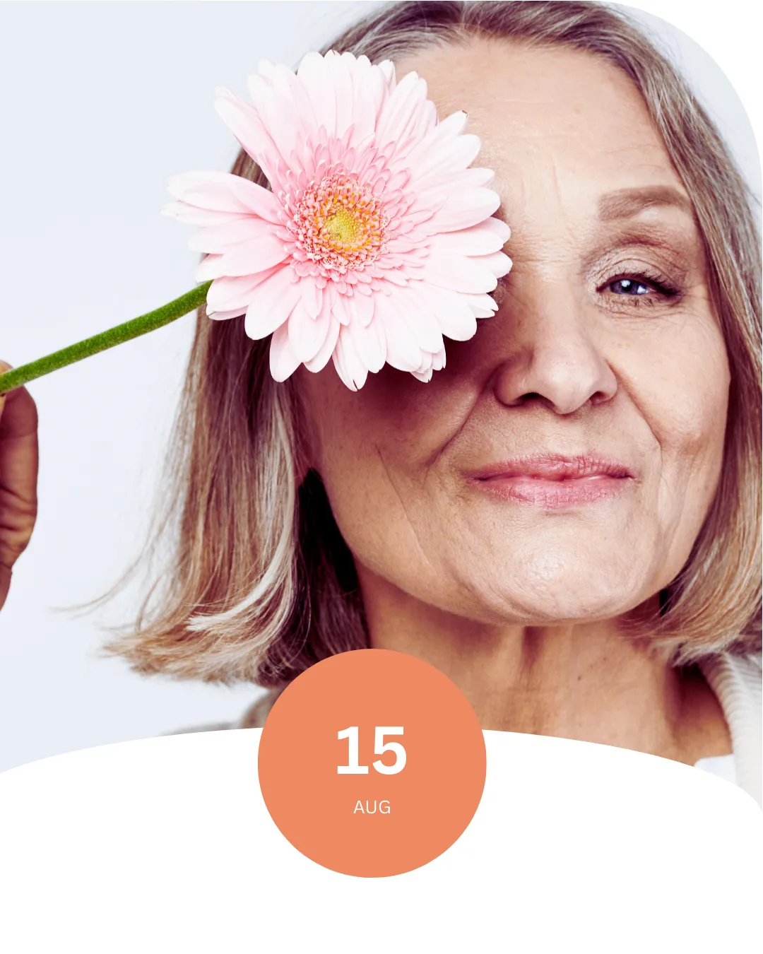 Mature woman in clinic reading educational material about breathing and myofunctional therapy.