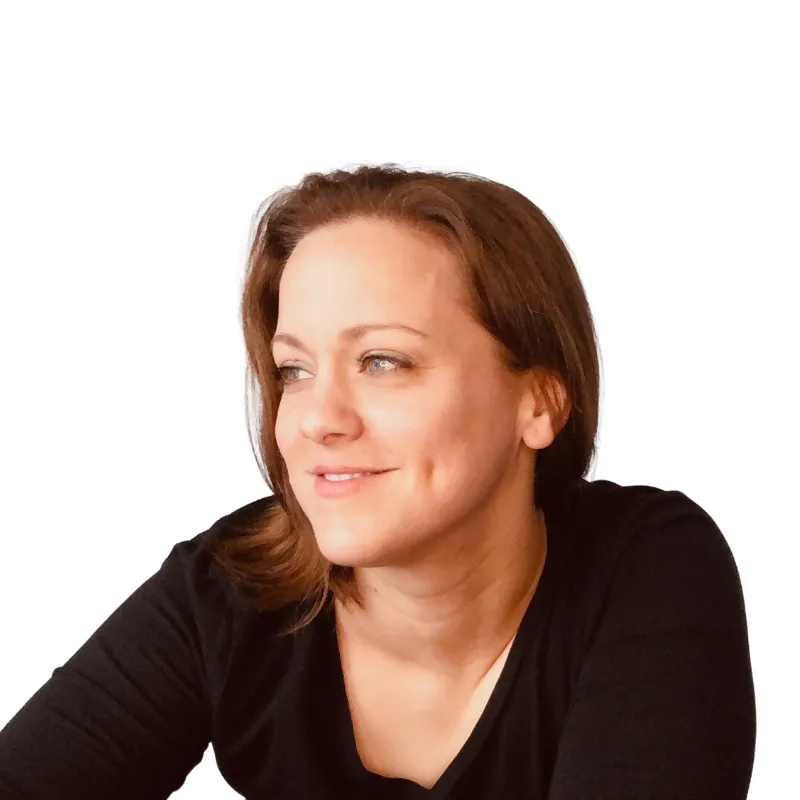 [Trainer's Name] smiling outdoors, wearing athletic wear, sunlight filtering through trees, exuding warmth and approachability, 3:2 aspect ratio