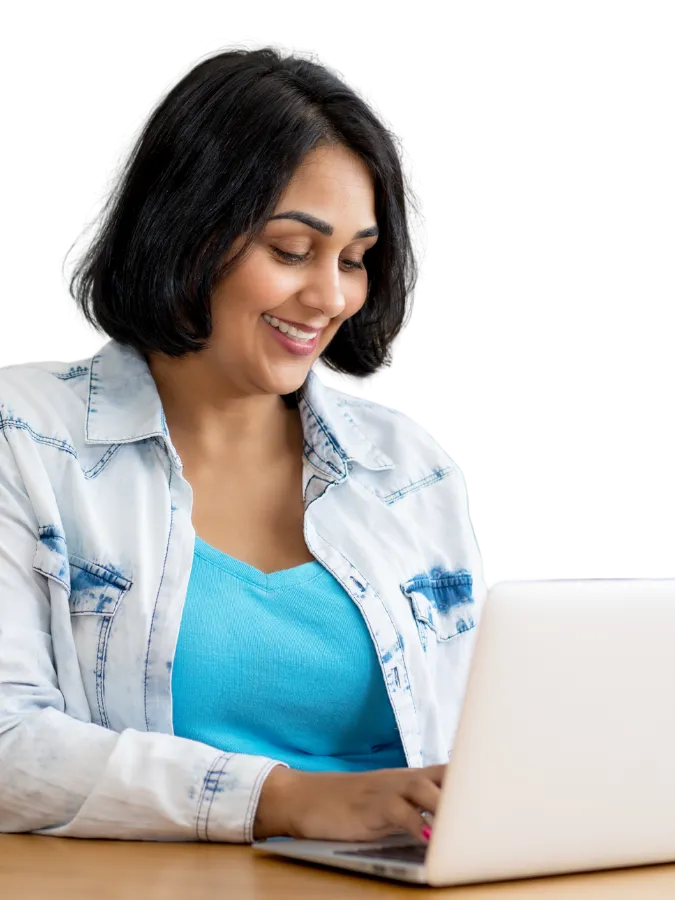 Happy woman working on her laptop