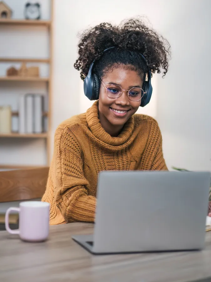 Happy woman working on her laptop
