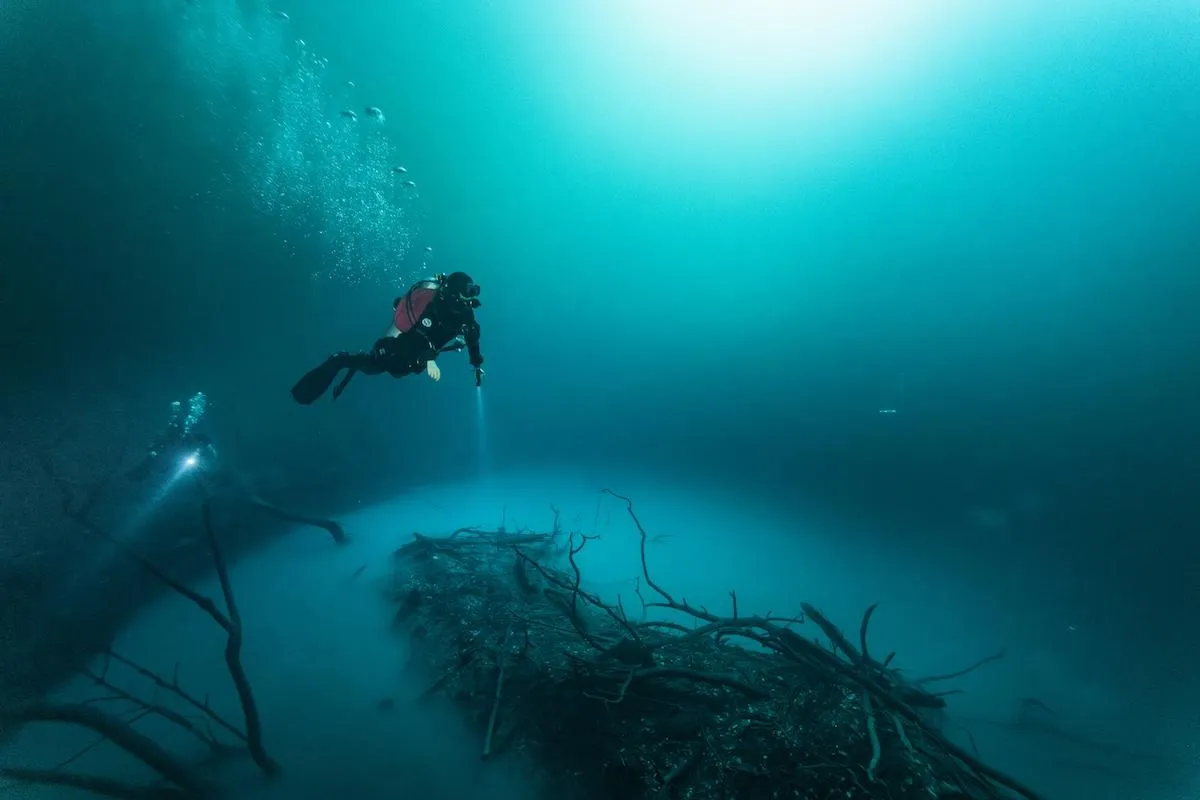 Diver above the hydrogen sulfide cloud at Angelita cenote