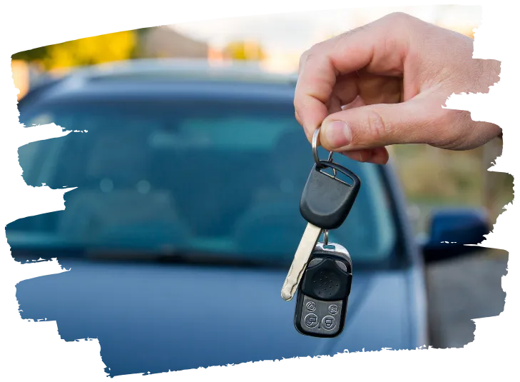 car background someone holding keys
