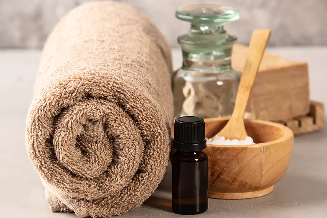 blue and white ceramic container on brown wooden table