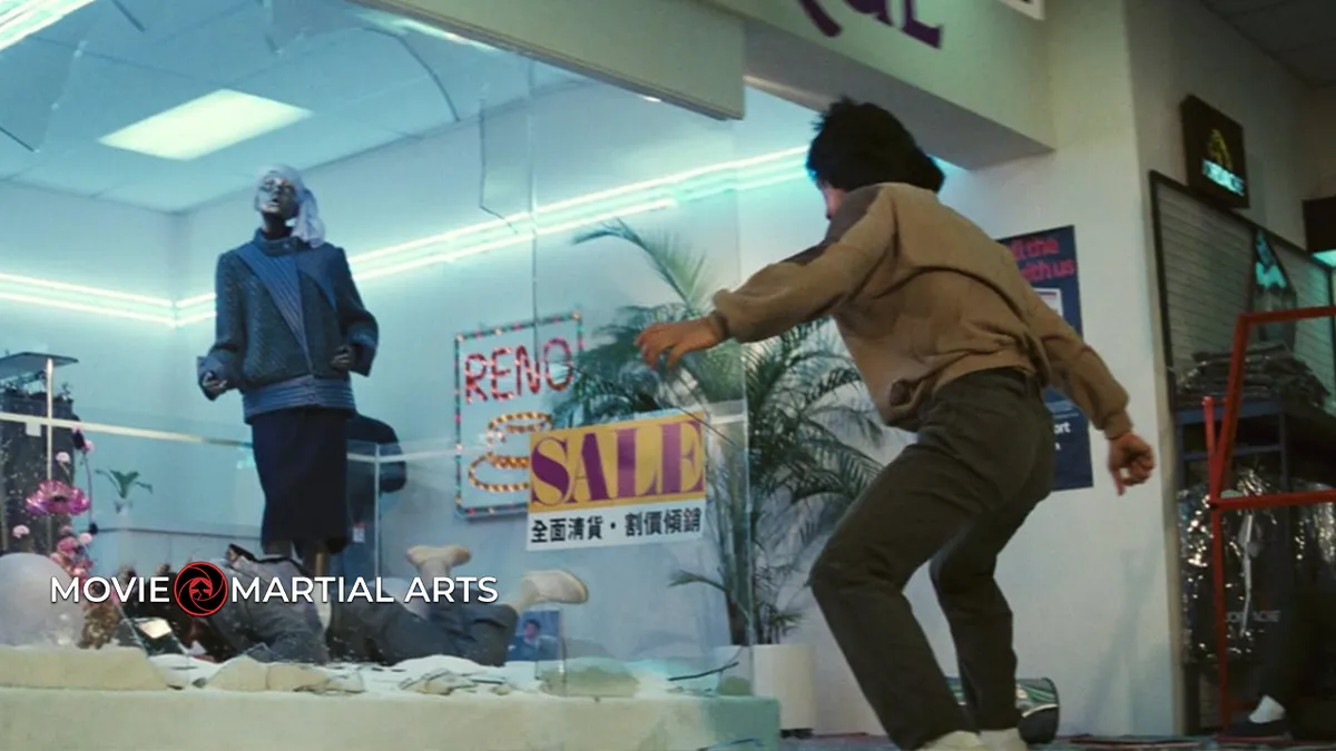 Jackie Chan performing a dangerous stunt during the shopping mall fight scene in Police Story.