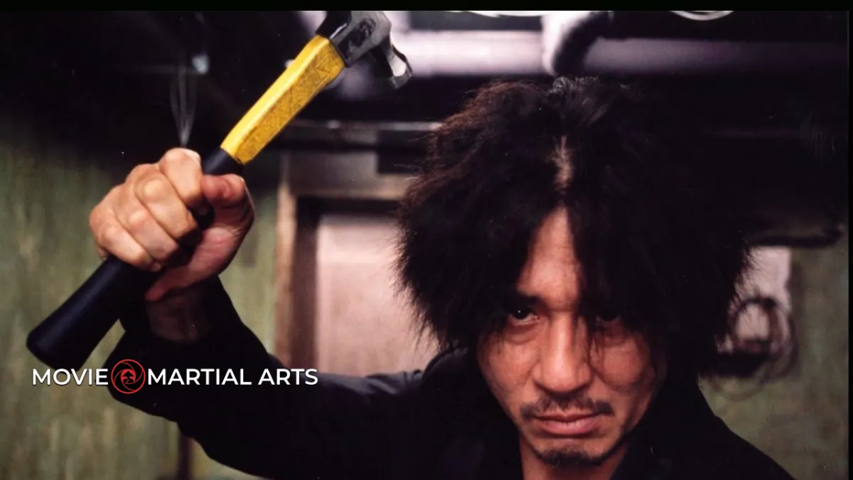 Armed with nothing but a hammer, Choi Min-sik delivers one of cinema’s most unforgettable single-take fight scenes in Oldboy.