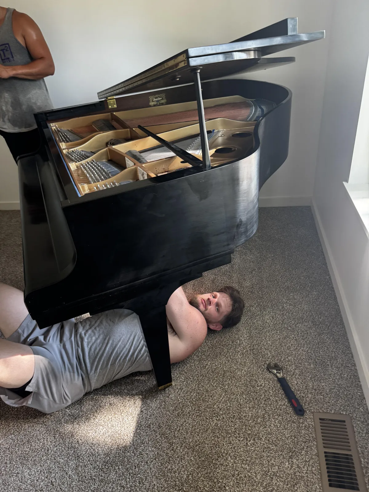 black grand piano post move