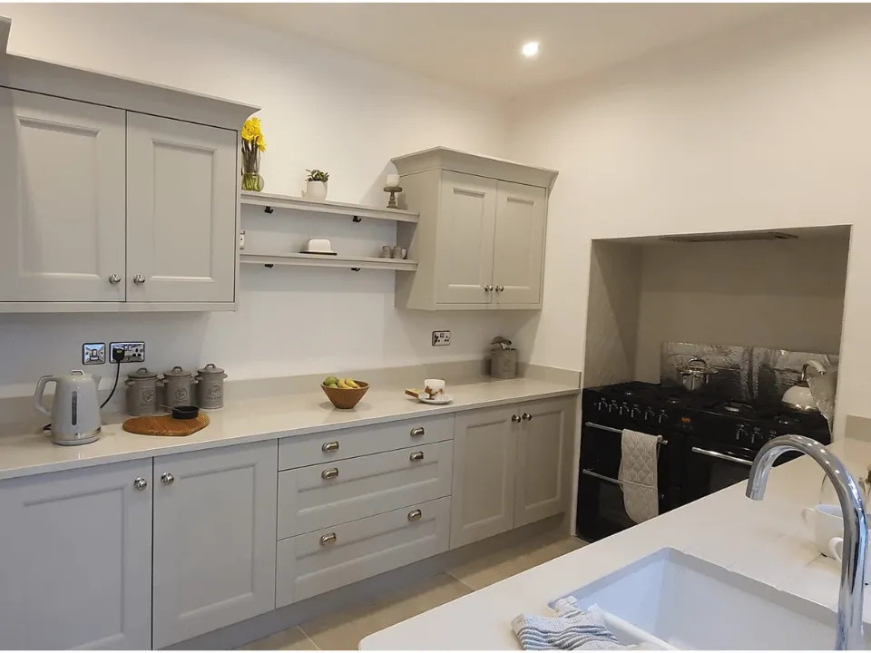 Photo of a light grey bespoke kitchen that we fitted in Carmarthenshire