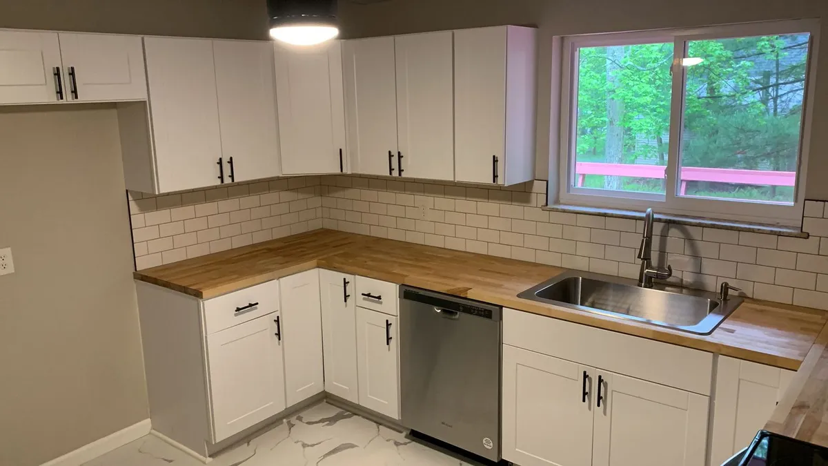 Beautifully remodeled rental kitchen with white shaker cabinets in Northeast Pennsylvania