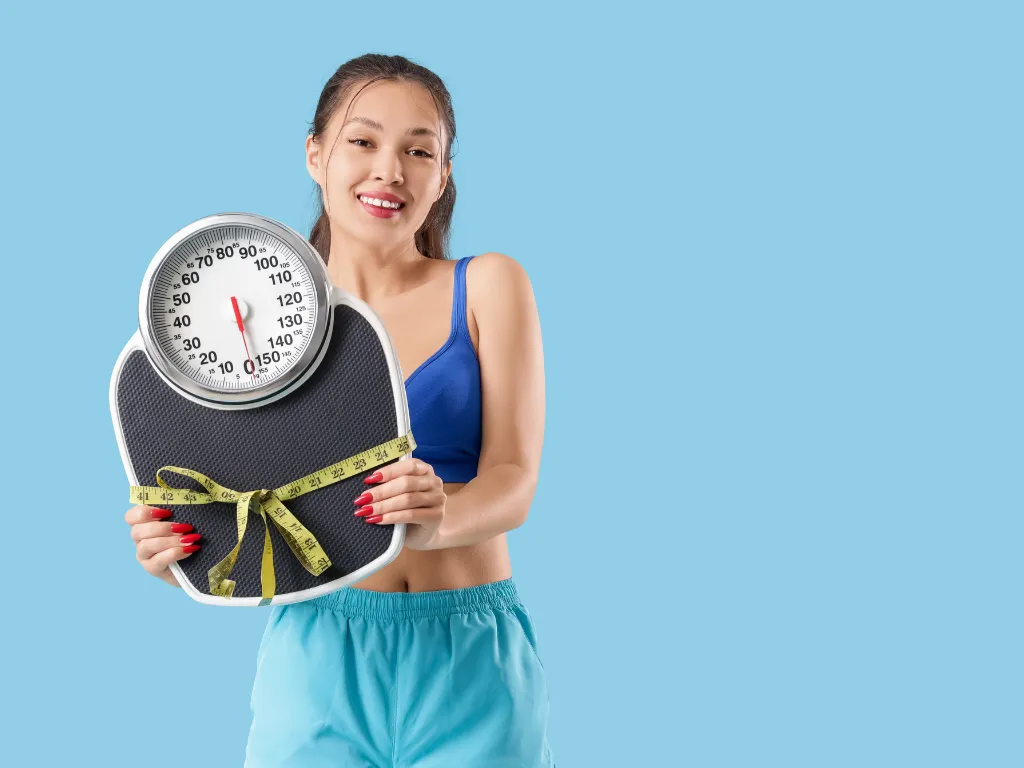 photo of silhouette photo of man standing on rock