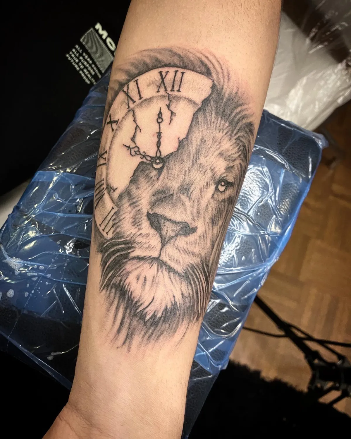 person with tattoo on right arm