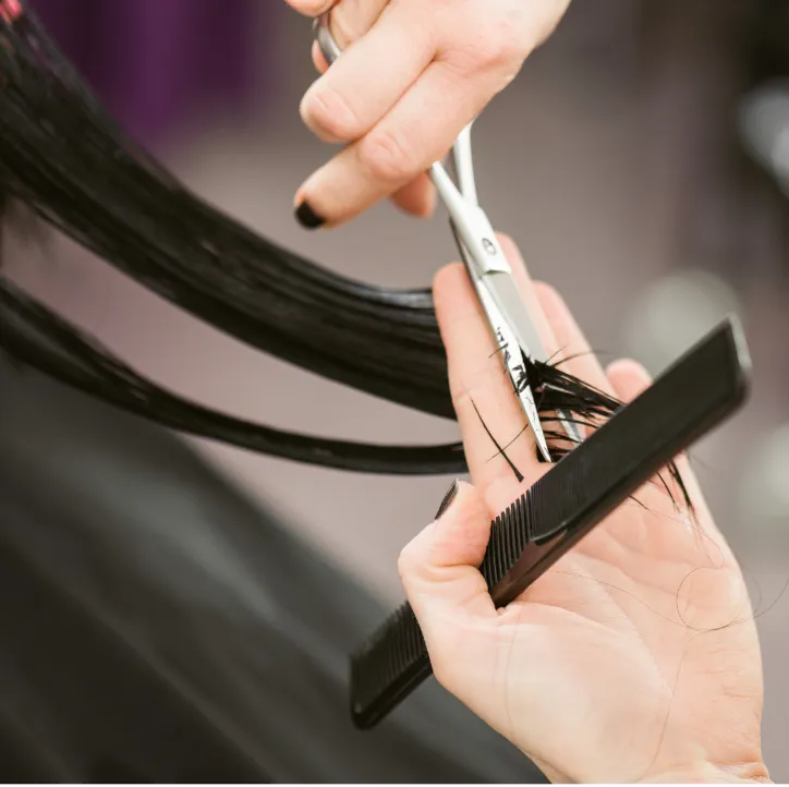 Model applying makeup for a photo shoot