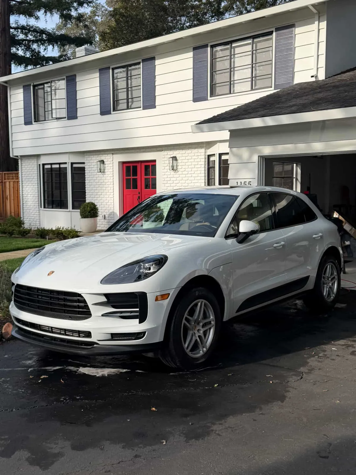 A white car sedan that is done with Menlo Detailing