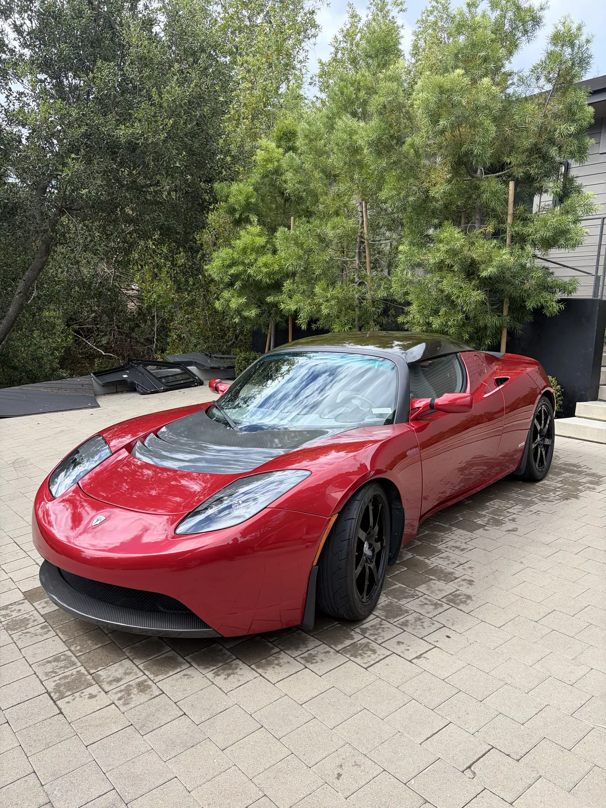 Red car showing the results of proper professional detailing