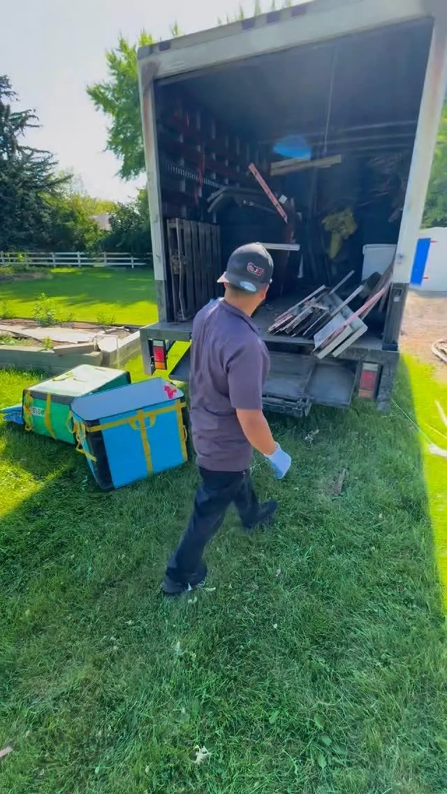 Junk Holler team doing junk removal in Boise, ID