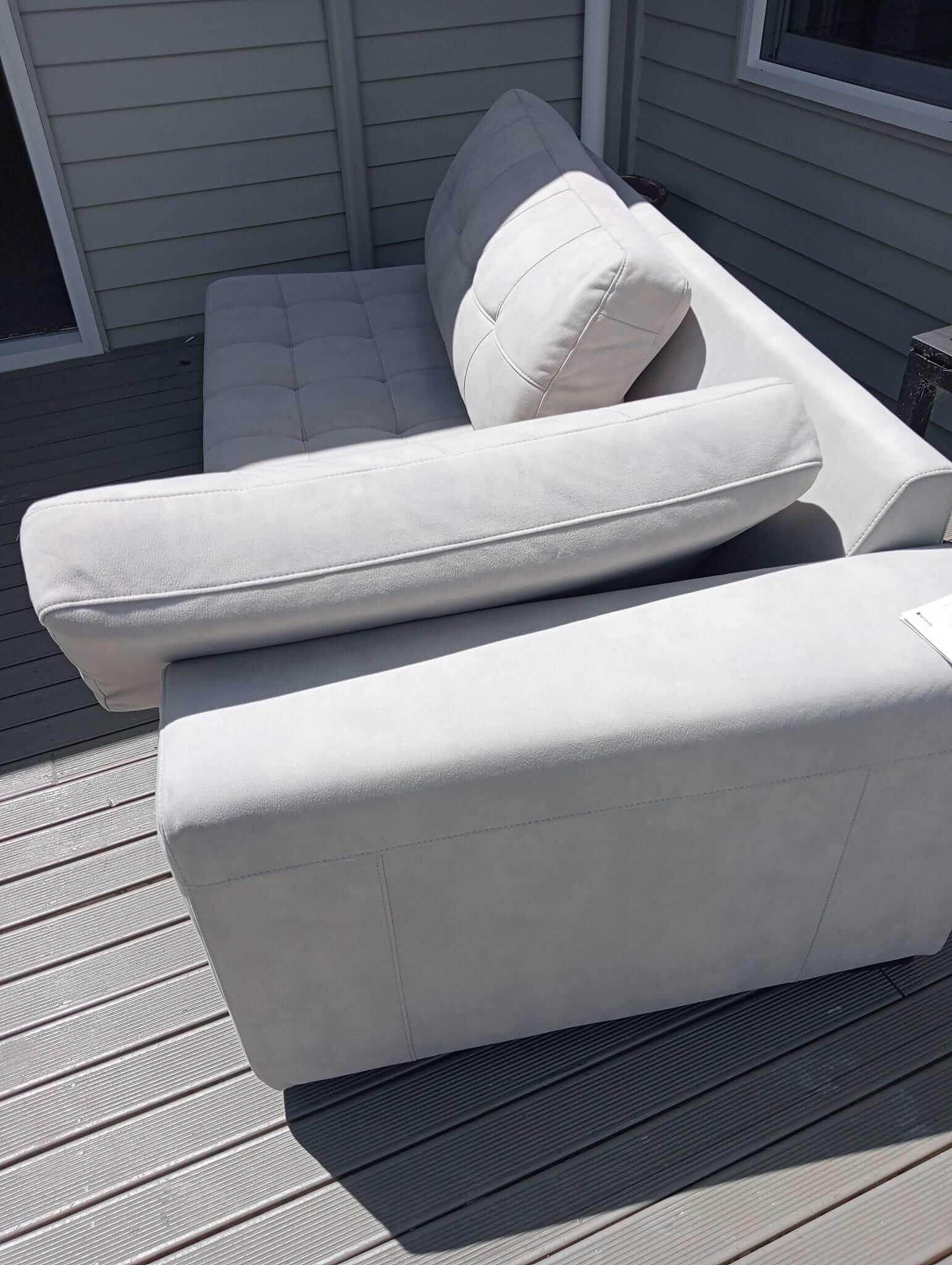 Professional carpet cleaning service in Whangarei restoring outdoor sofa