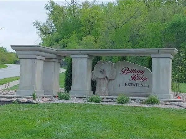 Composite deck with privacy screen in Brittany Ridge