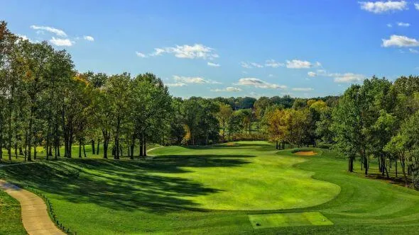 Multi-level cedar deck overlooking golf course in Old Hawthorne