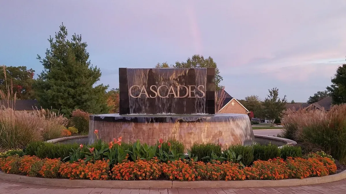 Composite deck with black railings in The Cascades subdivision