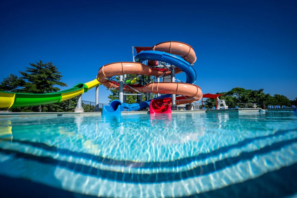 Elevated grilling deck with black railing near Koch Park