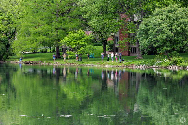 Two-level cedar deck with stairs and rail in Southern Hills